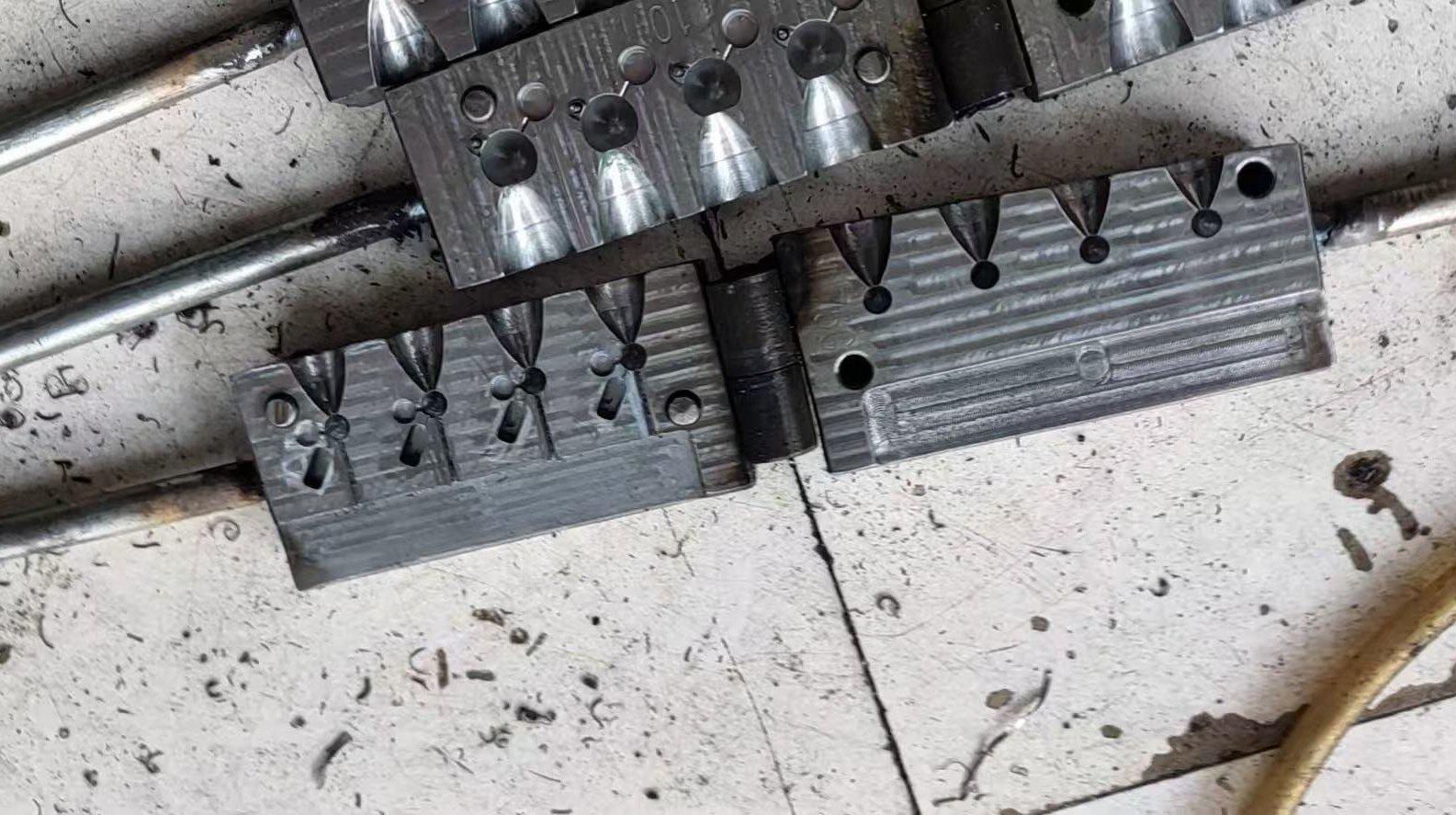 The cost of producing molds. Excluding shipping costs